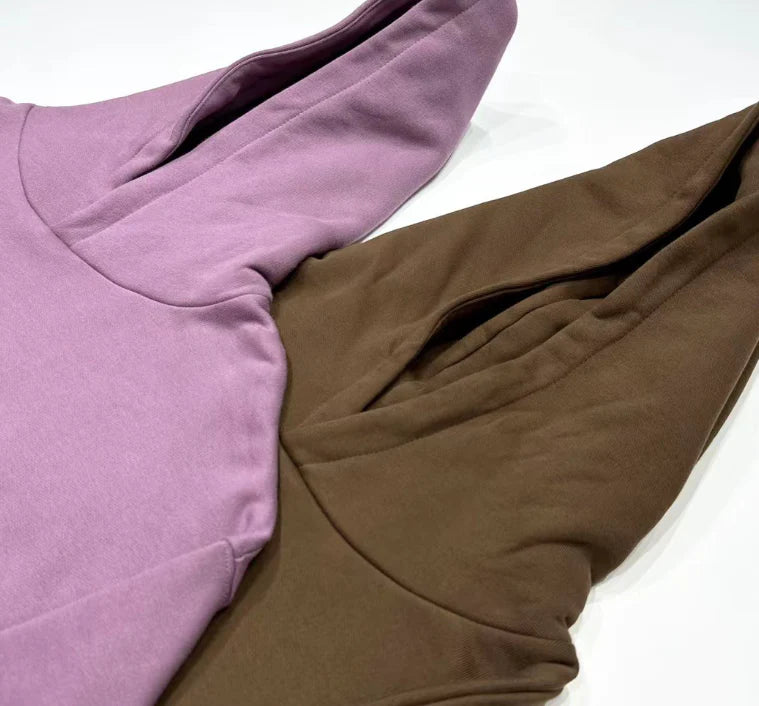 Trendha Two-Tone Hooded Sweatshirt with Star Print in Purple