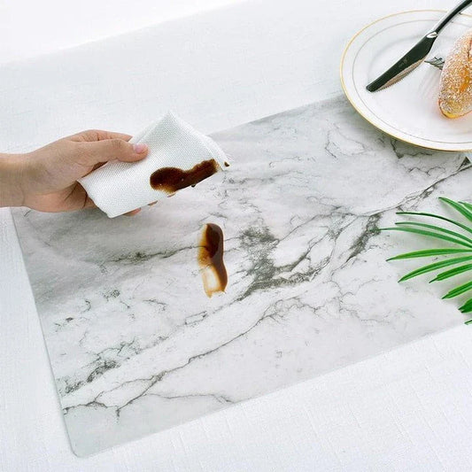 Marble pattern placemats in black and white color, made of durable PVC material to protect your dining table