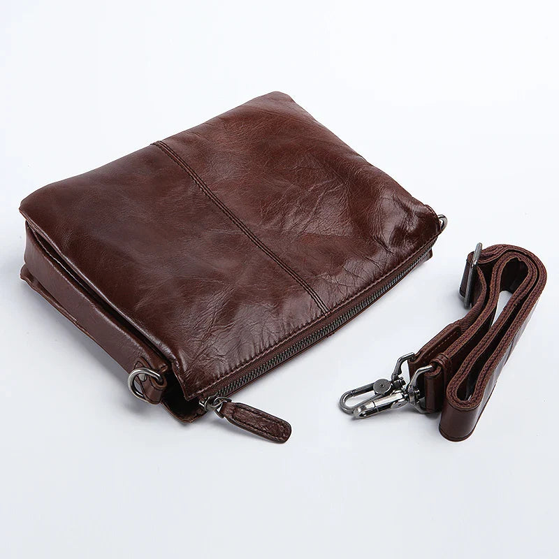 Premium cowhide leather crossbody bag with versatile internal compartments, perfect for the modern British fashionista