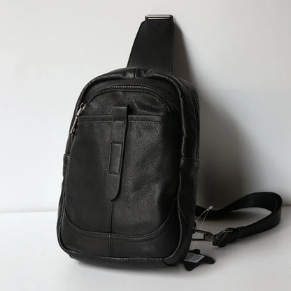 A high-quality leather chest bag in a vertical design, perfect for outdoor activities and adventures.