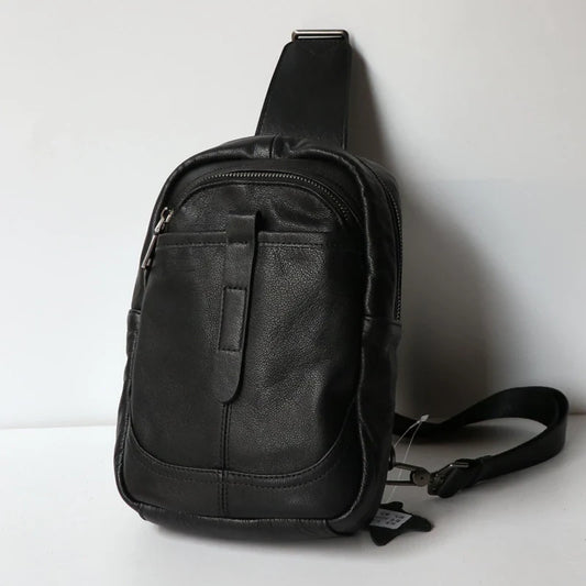 A high-quality leather chest bag in a vertical design, perfect for outdoor activities and adventures.
