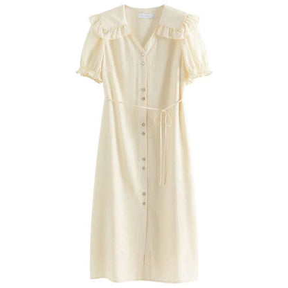 Elegant Navy Sailor Collar Dress with Signature Fungus-Edged Sleeves, a knee-length dress with a unique collar and delicate sleeve details