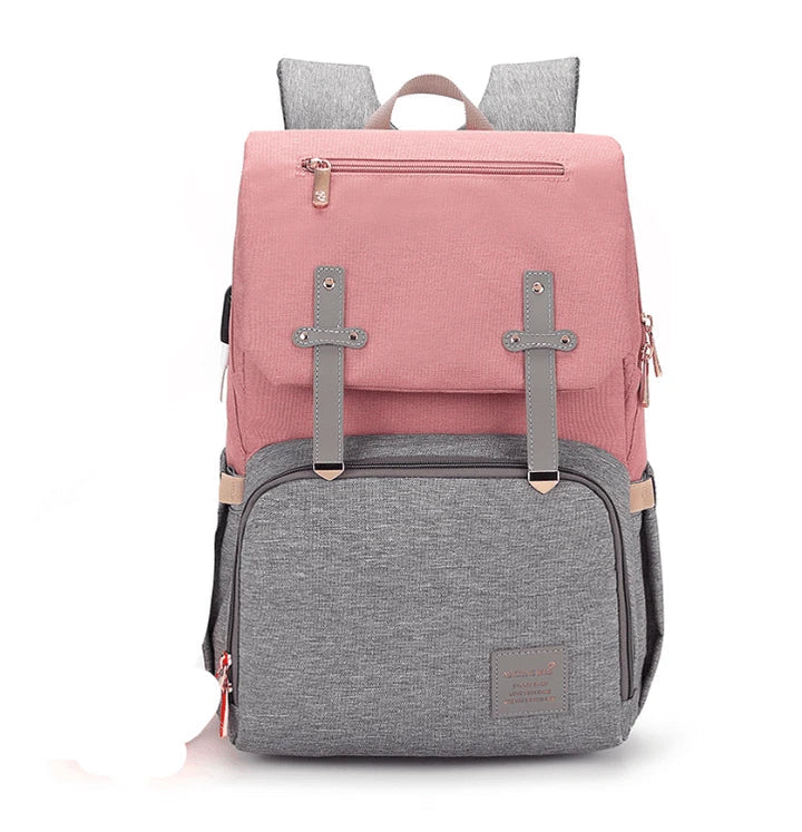 A stylish and practical mummy backpack with multiple pockets, perfect for organising and transporting all your parenting essentials.