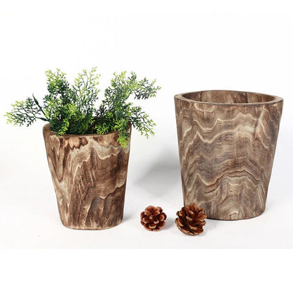 Handmade wooden flower pot and vase in a modern, minimalist design made from sustainable willow wood