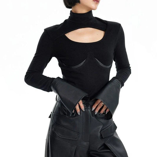 Chic knitted pullover with PU leather patchwork details, a versatile winter wardrobe essential.