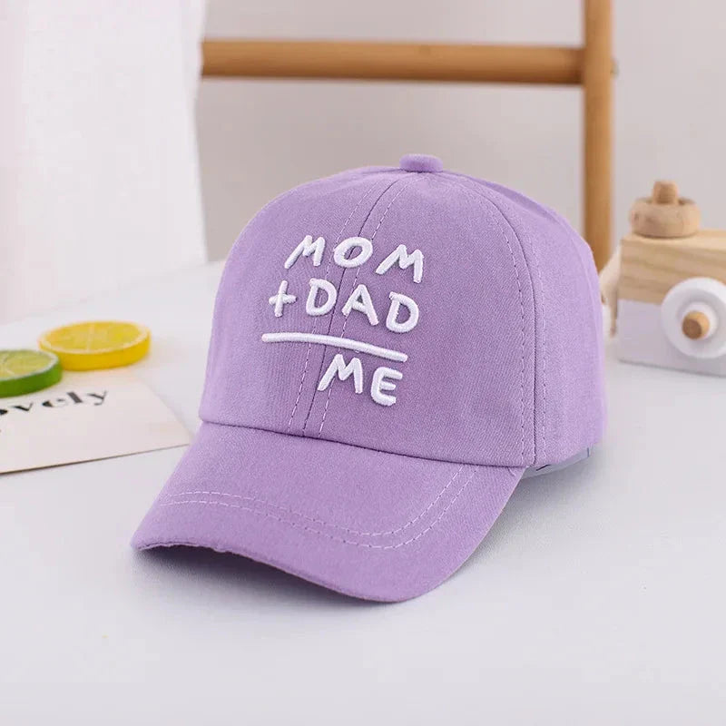 Adjustable cotton sun hat for kids with 'MOM+DAD=ME' embroidery, offering UV protection and breathable comfort