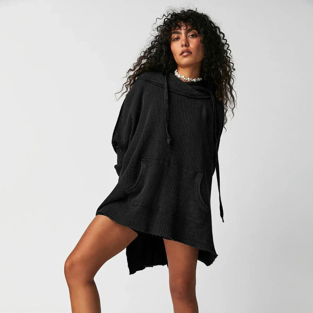 Cosy and stylish oversized hoodie with practical pockets for women, available in black, charcoal grey, and navy blue