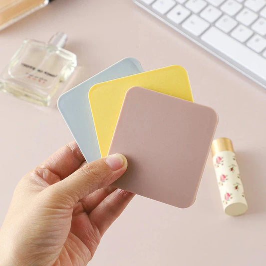 Compact double-sided makeup mirror in multiple vibrant colours, featuring a foldable design for easy portability