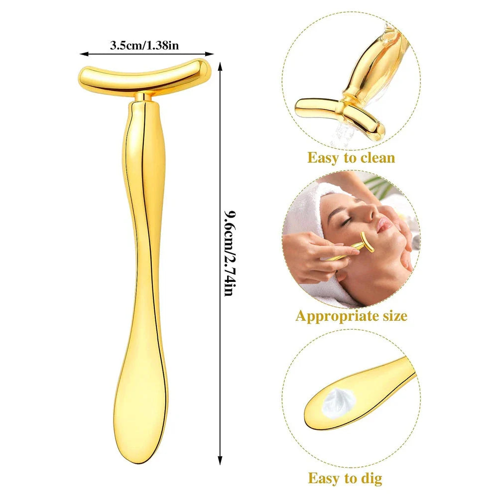 A rose gold metal eye cream applicator and face massager tool with a Y-shaped design for effective skincare application and facial massage