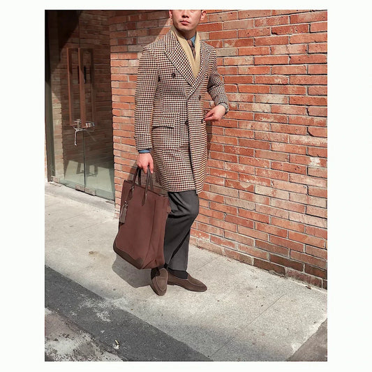 Double-breasted thick houndstooth coat in a vintage-inspired design, featuring a premium wool-rich fabric and a refined silhouette