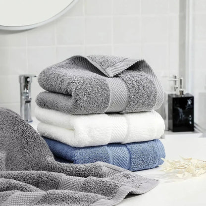 Premium 100% cotton face towel in blue, featuring a soft and absorbent design for daily facial cleansing and bathing