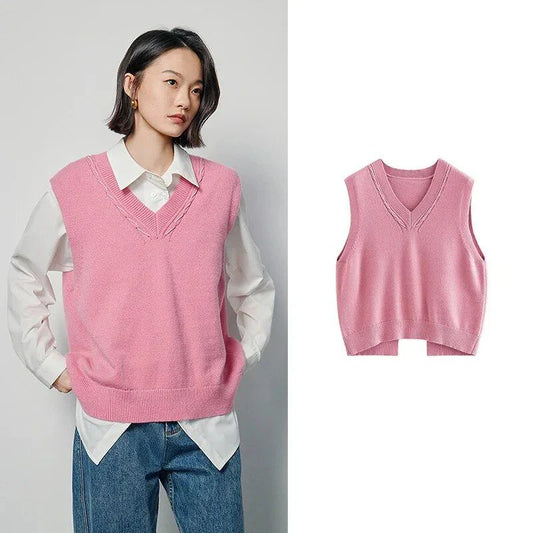 Elegant sleeveless v-neck knit vest in rose red and black colours, with a stylish split back design for a flattering silhouette