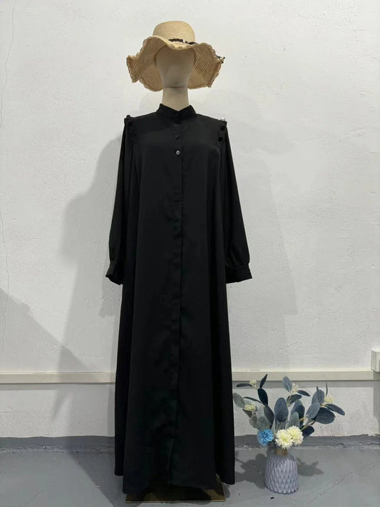 Premium black commuter swing skirt dress with long sleeves and an elegant A-line silhouette