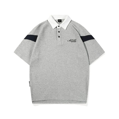 Melange grey polo shirt with contrast stitching, designed and made in Britain for comfortable summer wear