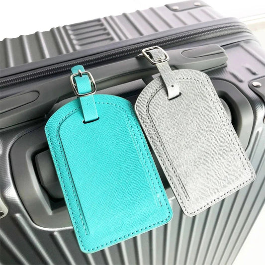 Premium PU leather luggage tag with secure strap and compact design for modern travellers