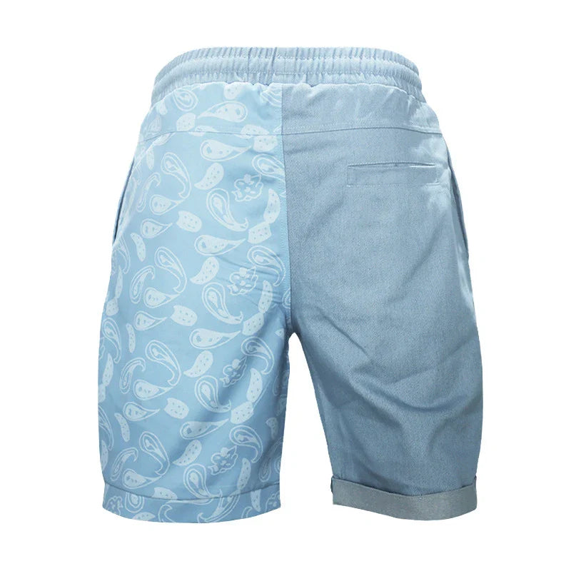 Relaxed-fit sports shorts in light blue and denim blue mosaic patterns, designed for casual everyday wear