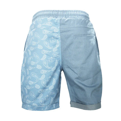 Relaxed-fit sports shorts in light blue and denim blue mosaic patterns, designed for casual everyday wear