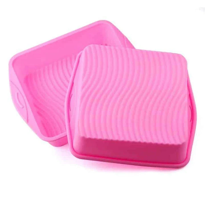 Premium square silicone cake baking mould in a vibrant pink colour