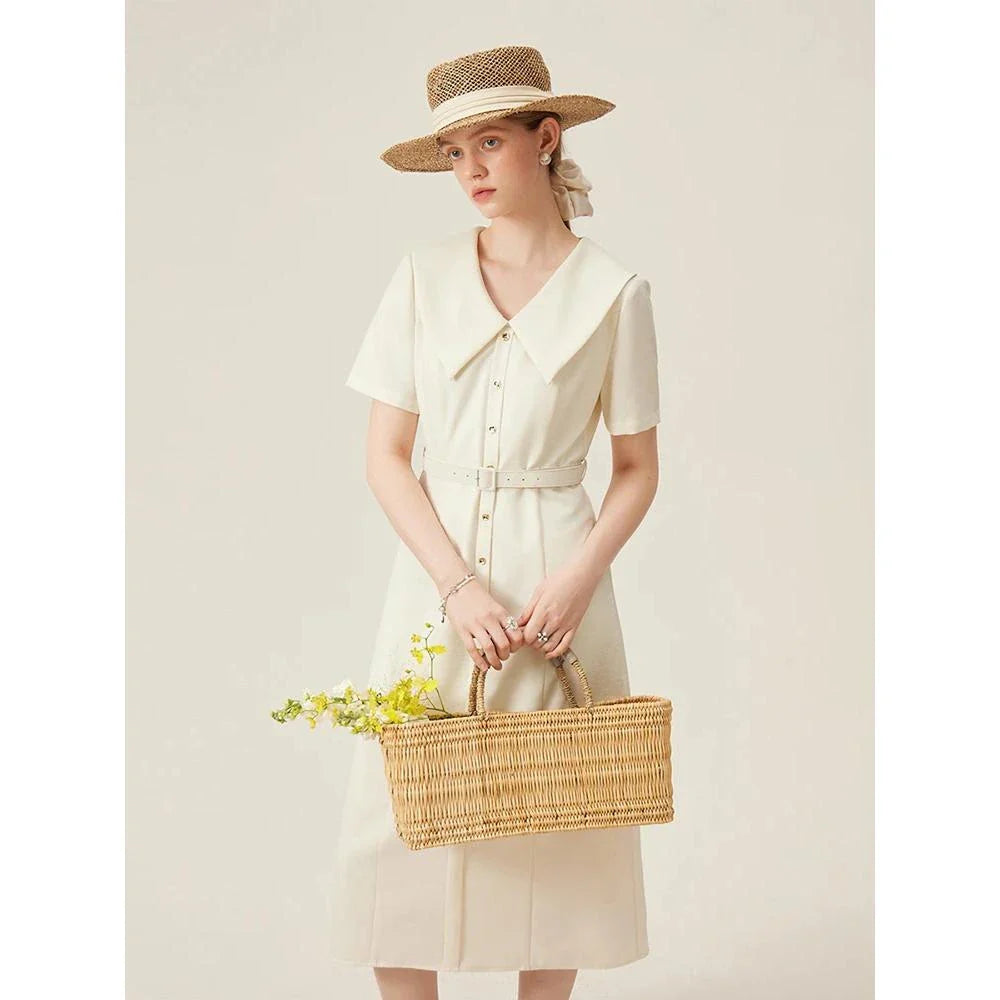 Elegant mid-calf summer dress in a sophisticated style, suitable for professional office wear and special occasions.