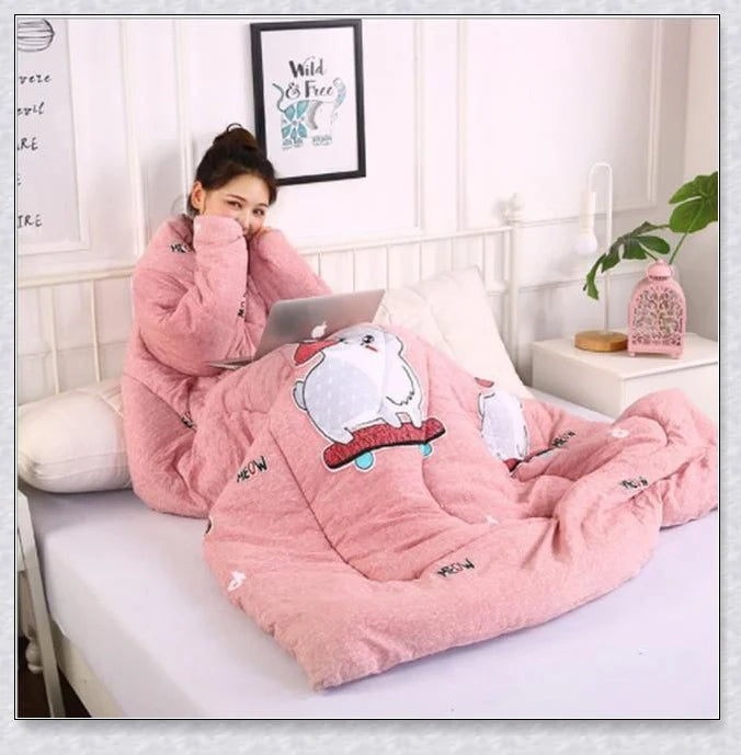 A cosy, wearable quilt with sleeves in a variety of colourful designs, perfect for staying warm and comfortable during the winter months.