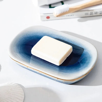 Luxury Ceramic Bathroom Accessory Set with shampoo dispenser, toothbrush cup, soap box, and versatile container in a modern, minimalist design