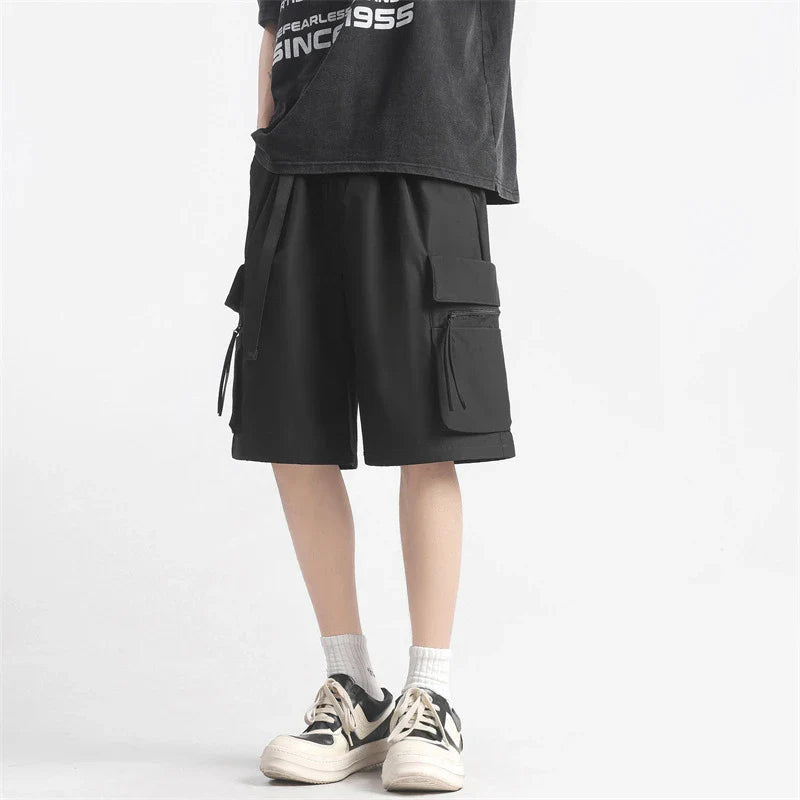 Trendy multi-pocket workwear shorts in a variety of colours, including black, khaki, green, and light grey, with a straight-leg design and ample storage options.