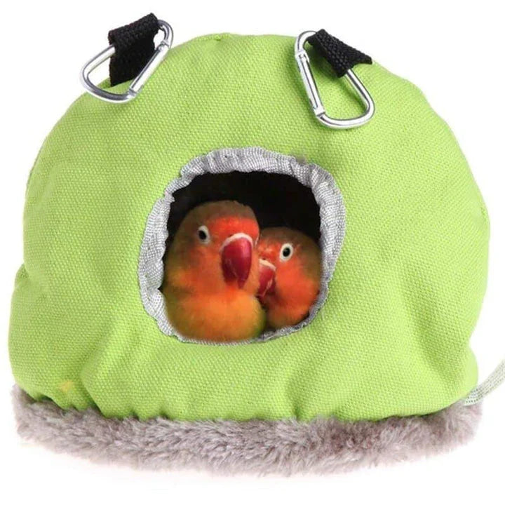 Cosy cotton pet bed in green, providing a plush and supportive sleeping surface for small animals