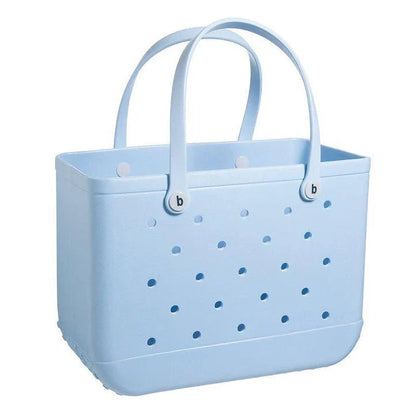 Premium waterproof beach tote bag in various vibrant colours, featuring spacious main compartment and multiple pockets for organised storage