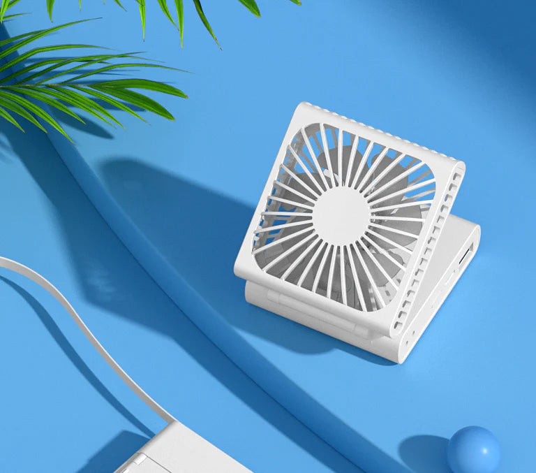 Compact portable USB power bank with built-in cooling fan, perfect for on-the-go use by British consumers