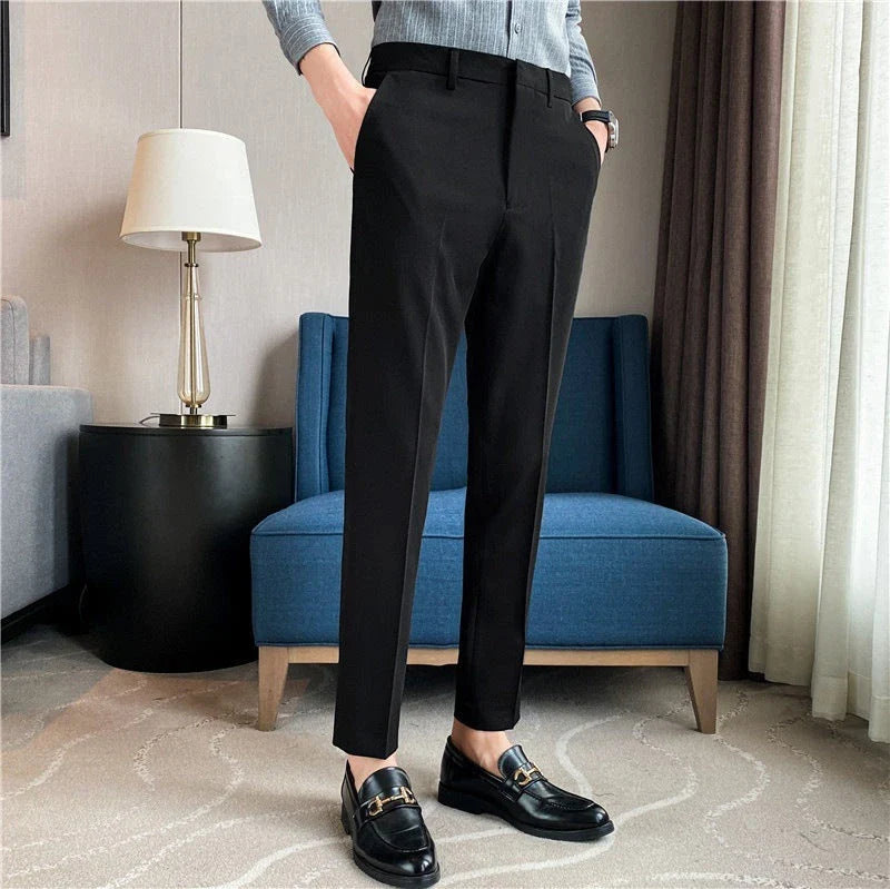 Premium men's suit trousers in a variety of colours, featuring a subtle textured drape and exceptional stretch for all-day comfort and style.