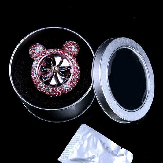 Glamorous pink crystal car air freshener with internal fan and jewel accents