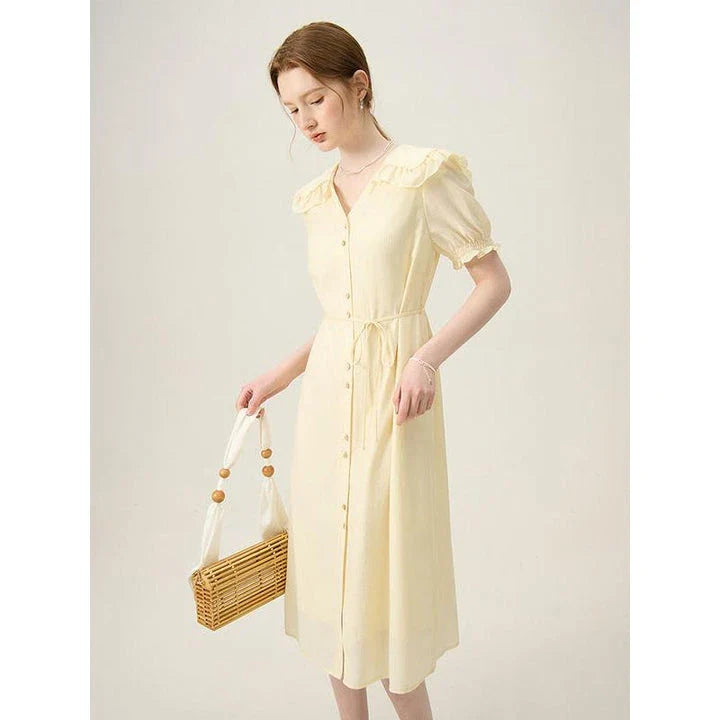 Elegant Navy Sailor Collar Dress with Signature Fungus-Edged Sleeves, a knee-length dress with a unique collar and delicate sleeve details