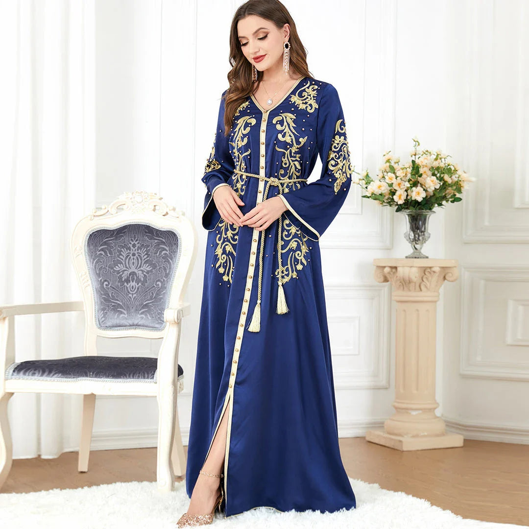 Elegant long-sleeve dress with floral embroidery in a sophisticated sapphire blue colour, suitable for British women