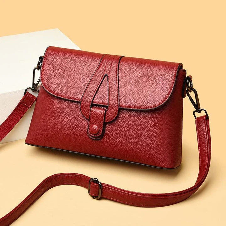 Premium genuine leather diagonal shoulder bag in a range of stylish colours, featuring a roomy interior, adjustable strap, and sophisticated design