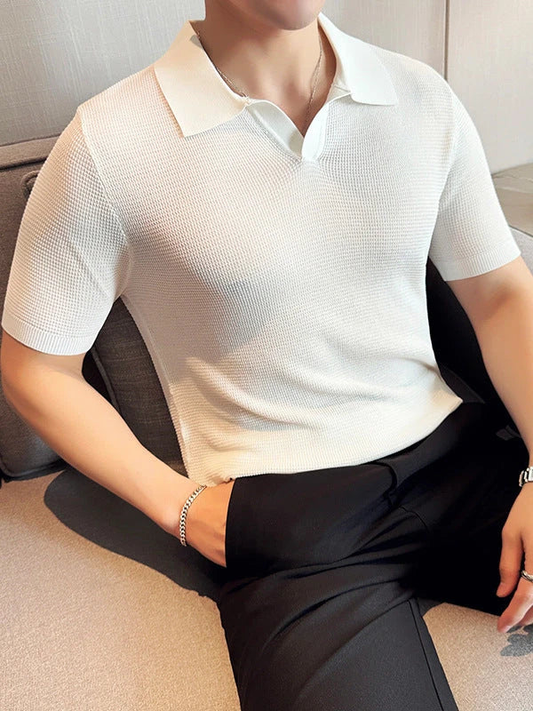 A premium cotton blend polo shirt in classic colours, featuring a v-neck lapel collar and slim fit design for a sophisticated casual look.