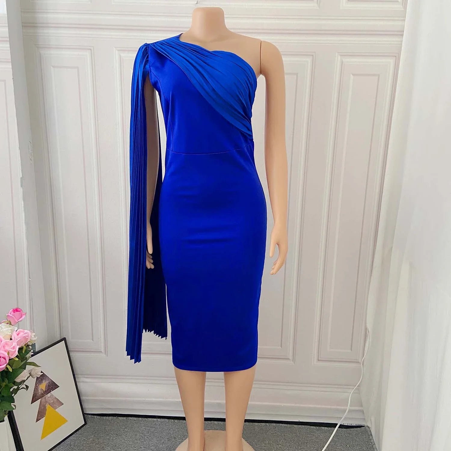 Sophisticated one-shoulder plus size evening dress with an alluring asymmetric neckline and figure-flattering silhouette