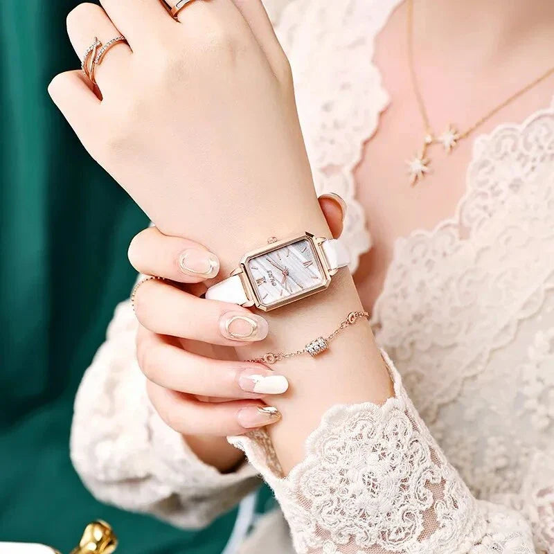 Refined square dial ladies watch with genuine leather strap, minimalist design, and durable aluminium alloy case
