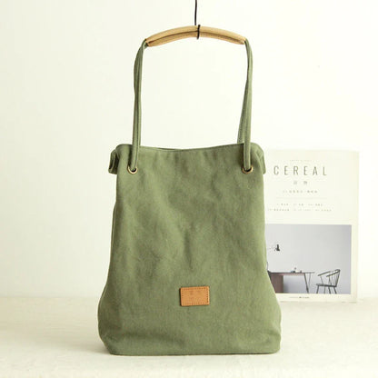 Premium canvas lattice shoulder bag in various colours, featuring a spacious design with secure zipper closure and adjustable strap for comfortable everyday carry