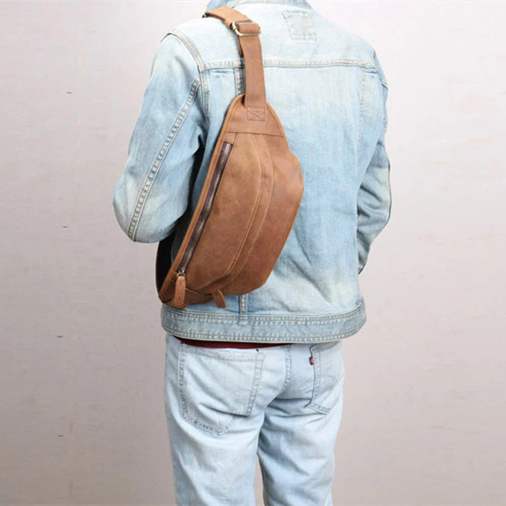 Premium British leather crossbody bag with adjustable strap and multiple pockets for organised storage