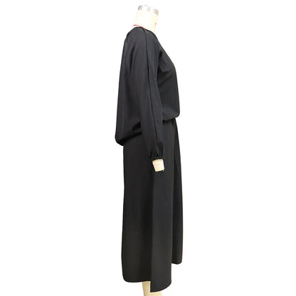 Elegant two-piece mid-length skirt suit with oblique shoulder design, made with premium polyester fabric and boutique four-sided elastic band