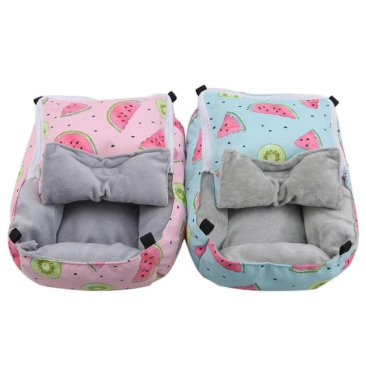 Cosy cotton pet bed in green, providing a plush and supportive sleeping surface for small animals