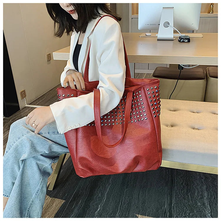 Premium British leather tote bag in black, featuring a large capacity design and stylish, versatile appeal.