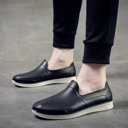 Stylish waterproof rain boots for men, featuring a unique design and durable construction for comfortable wear in wet weather.