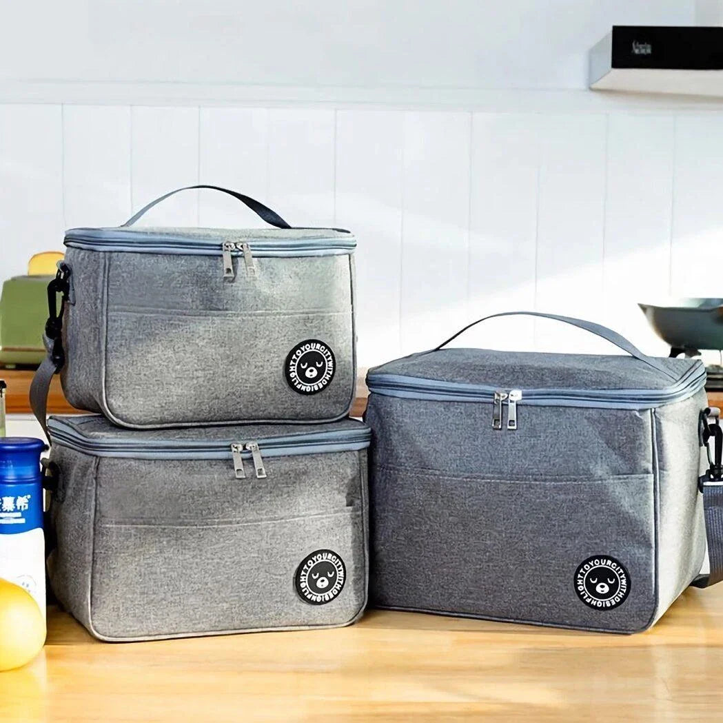 Premium thermal lunch bag in various colours, featuring insulation, waterproof design, and adjustable shoulder strap for busy UK professionals