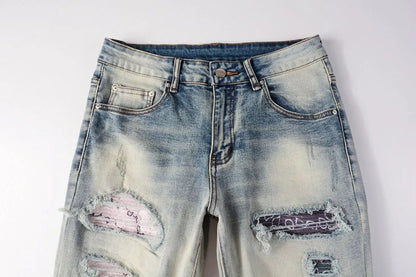 Stylish distressed denim jeans with a skinny, knee-exposed silhouette for a contemporary, high-street fashion look