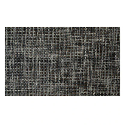Stylish and durable waterproof placemats in black, protecting a dining table from spills and stains