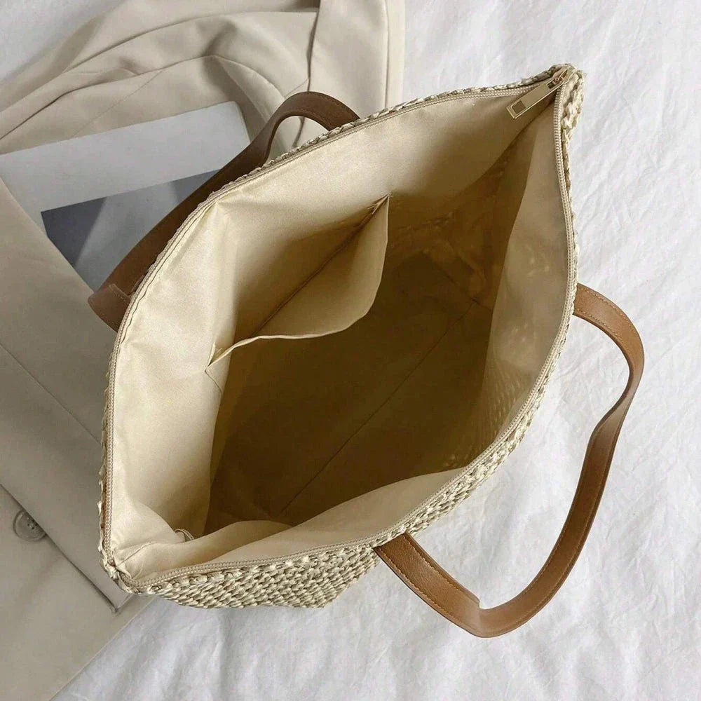 Elegant handcrafted woven straw tote bag in beige colour, perfect for summer outings and carrying essentials
