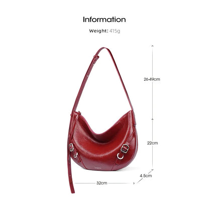 Elegant and versatile shoulder and crossbody bag in black, featuring a chic design, spacious compartments, and premium leather construction.