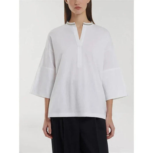 Stylish bead-embellished split-hem t-shirt in white, designed for the modern British woman with a touch of elegance and comfort.