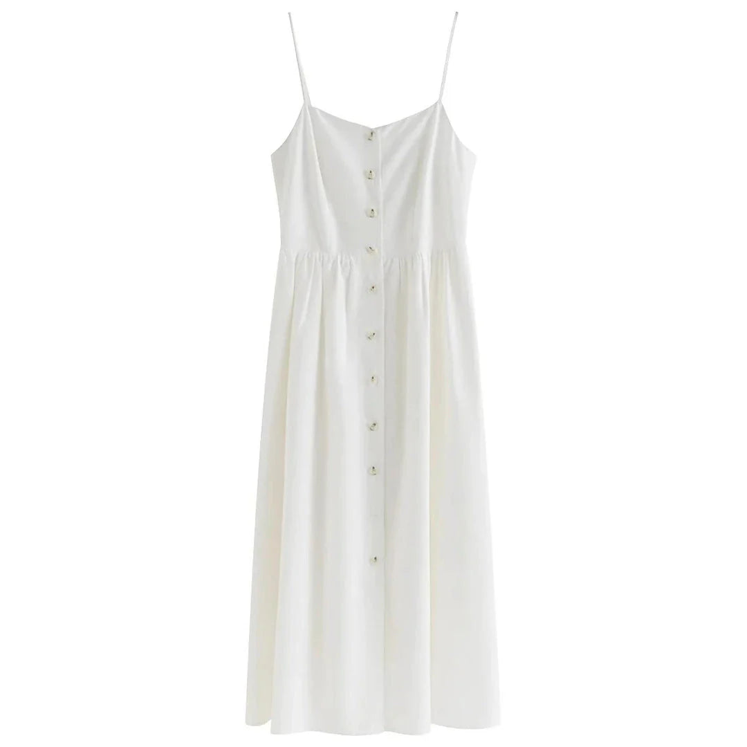 Elegant cotton and linen suspender dress with square collar neckline, A-line silhouette, and mid-calf length for a sophisticated and comfortable summer look.